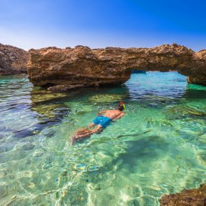 Blue,Lagoon,,Malta,-,Snorkeling,Tourist,At,The,Caves,Of
