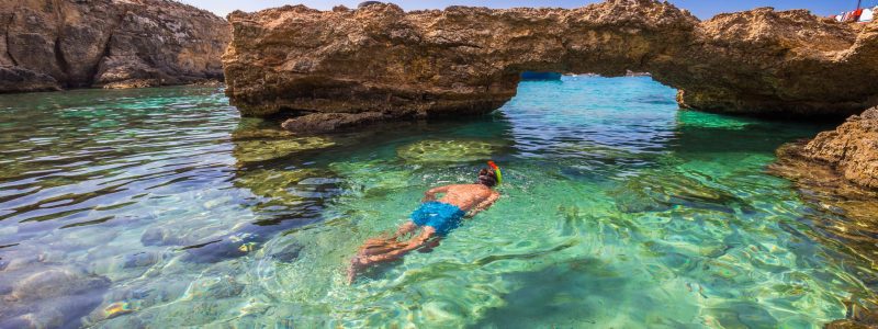 Blue,Lagoon,,Malta,-,Snorkeling,Tourist,At,The,Caves,Of